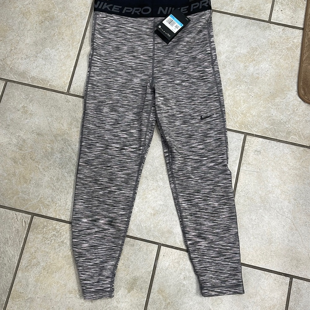 Nike pro tight fit crop, size medium. New with tag